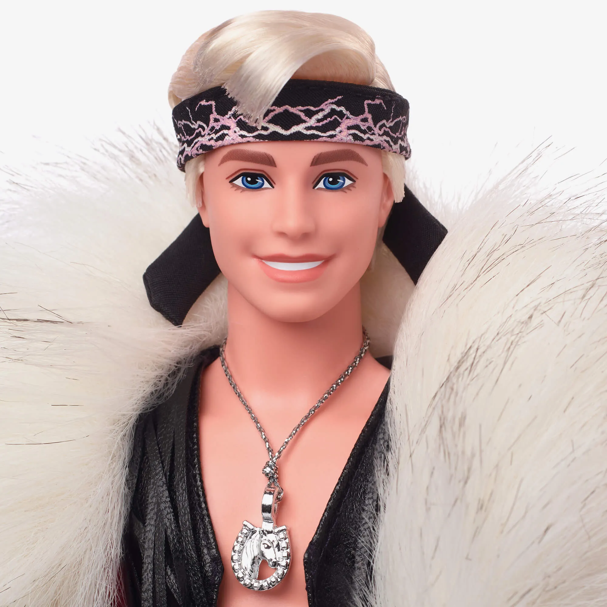 Ken Doll in Faux Fur Coat and Black Fringe Vest – Barbie The Movie