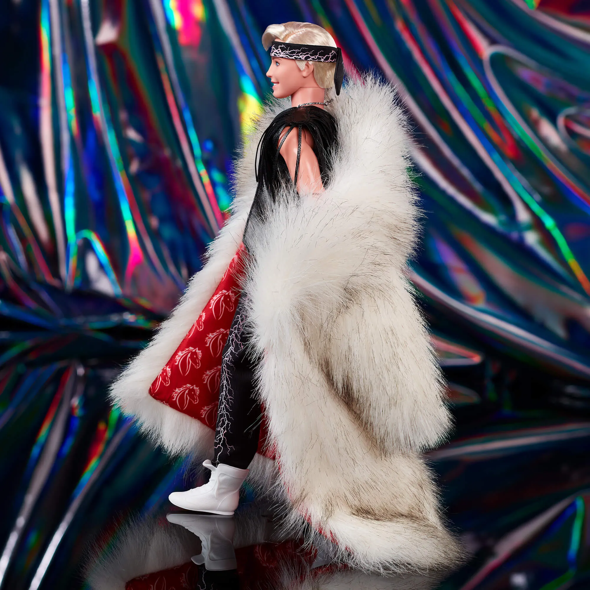 Ken Doll in Faux Fur Coat and Black Fringe Vest – Barbie The Movie